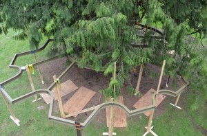 bent steel provides  tree house floor supports and decking