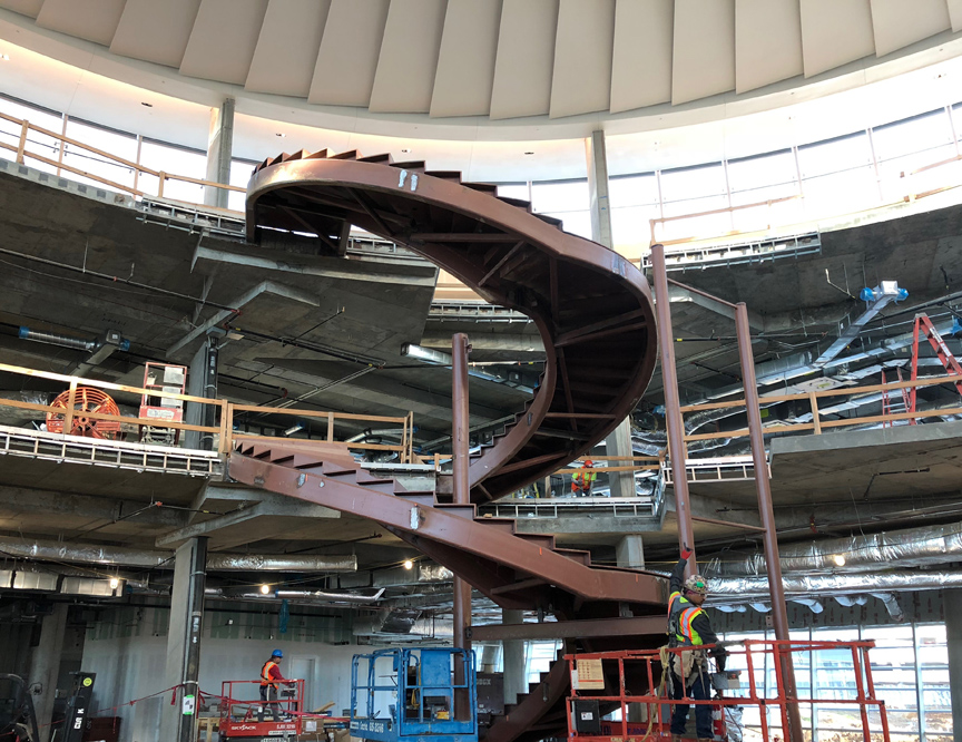 steel spiral stringers for custom spiral staircase at new American Airlines Headquarters in Fort Worth, Texas