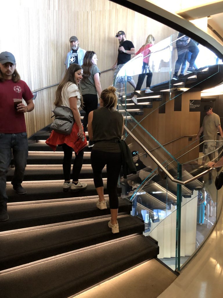 People walking on the spiral staircase at the Space needle