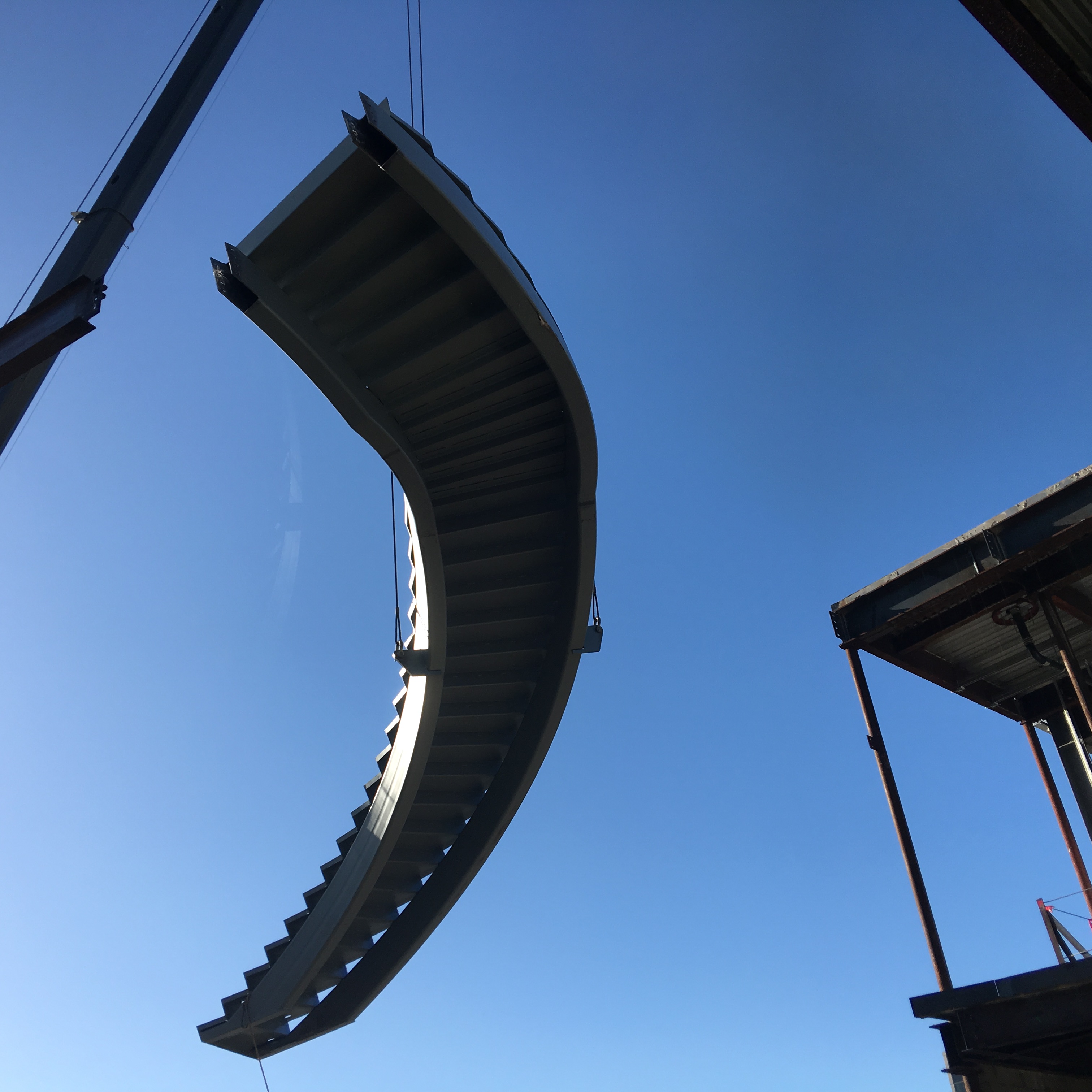 Spiral Staircase Being Lowered by Crane