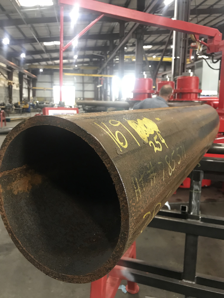 Close Up of Steel Pipe in a DAVI MCP3 Master Bender at Albina Co., Inc.