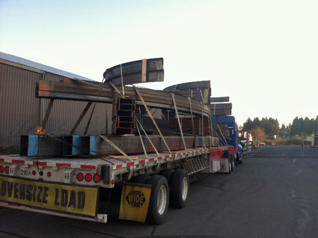 Oversized Load of bent structural steel getting ready for shipment