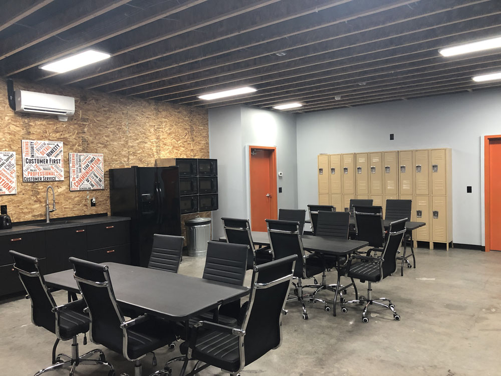 Lockers and custom painted doors in lunchroom at Albina Co., Inc.