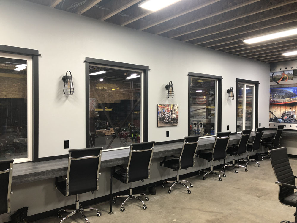 View out the lunchroom window down on shop floor at Albina Co., Inc.