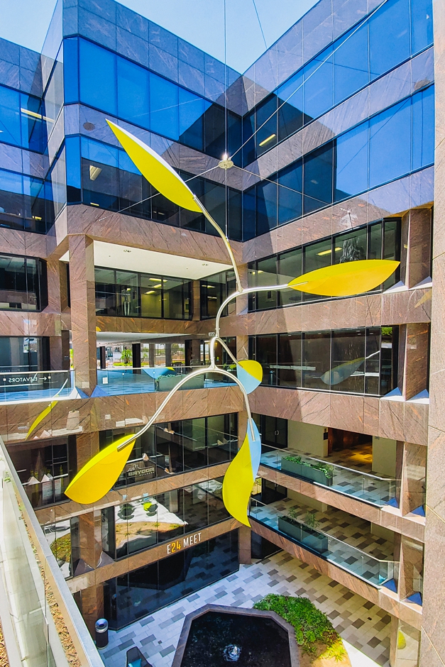 Curved Stainless Steel Artwork at Camelback Commons