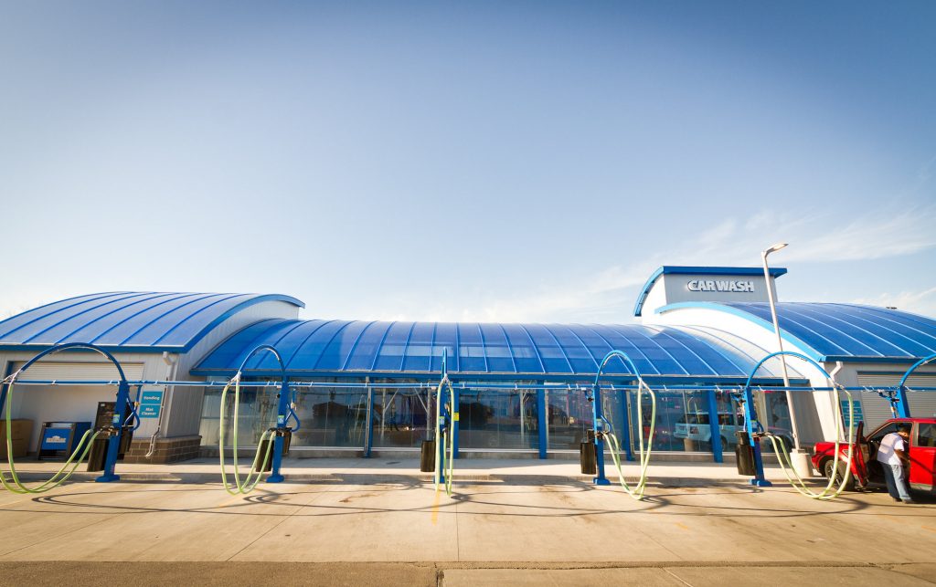 Curved Steel Roof Trusses at Living Waters Car Wash