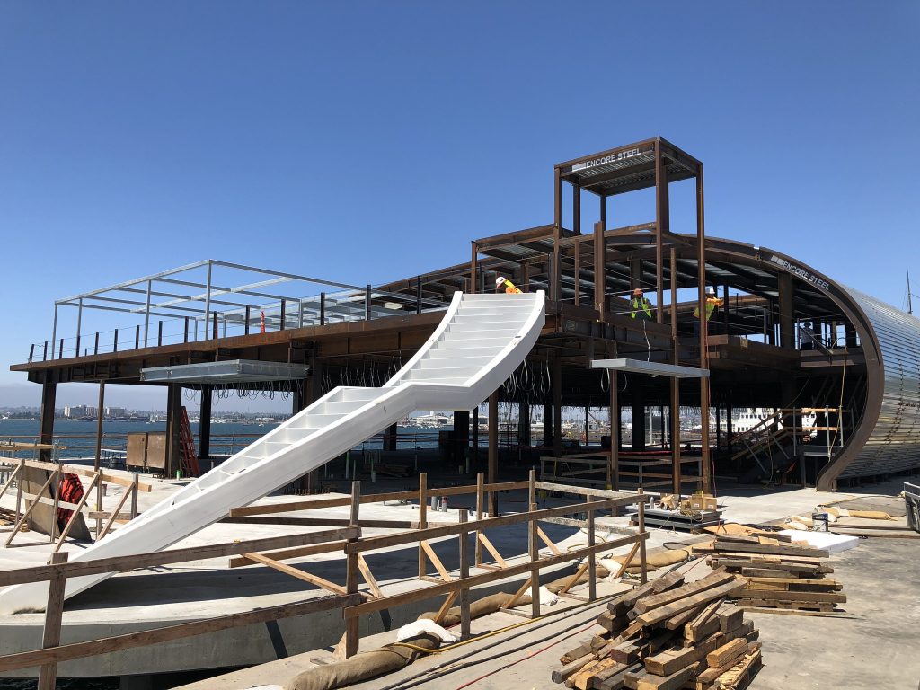 Curved Steel Roof and Spiral Staircase at Portside Pier